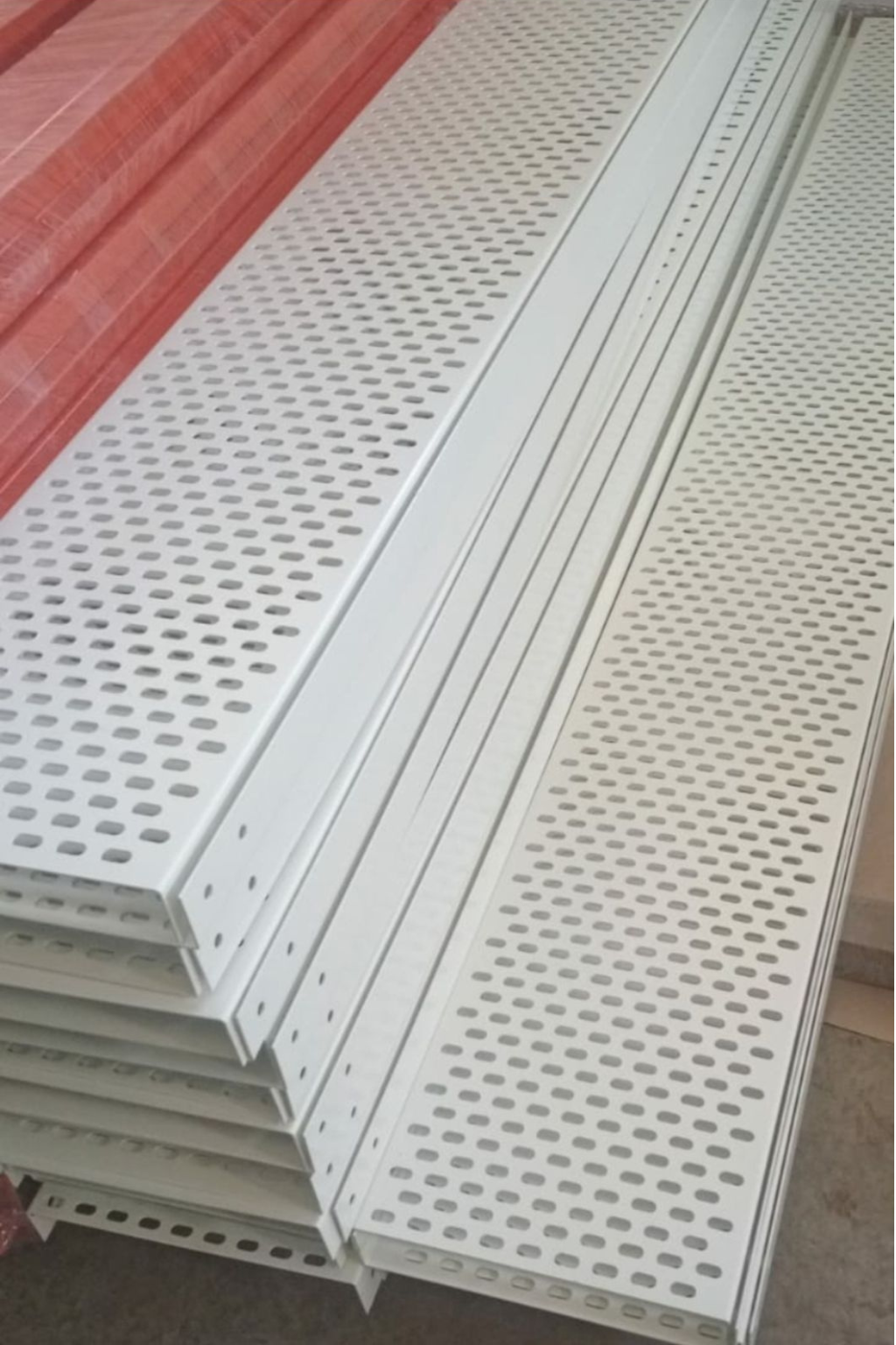 Powder Coated Perforated Cable Tray stacked for industrial cable management – durable corrosion-resistant metal tray with premium powder coated finish by Superfab Industries Pvt. Ltd.